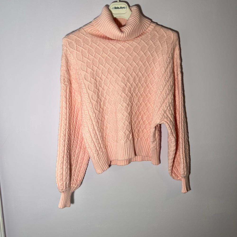 Embroidered pink turtle neck sweater